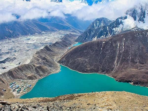 Thumbnail of Everest Base Camp trek via Gokyo Lakes, featuring dramatic mountain vistas and clear blue lakes in the Himalayas.